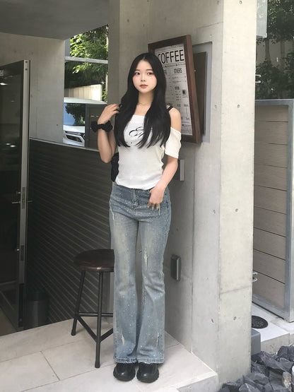 クリスタルストーンフレアデニムパンツ