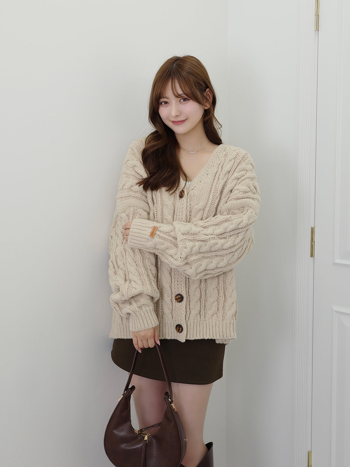 ケーブルニットルーズカーディガン